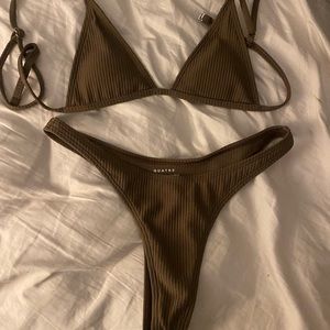 size small and medium available, new with out tags quatre swim suit